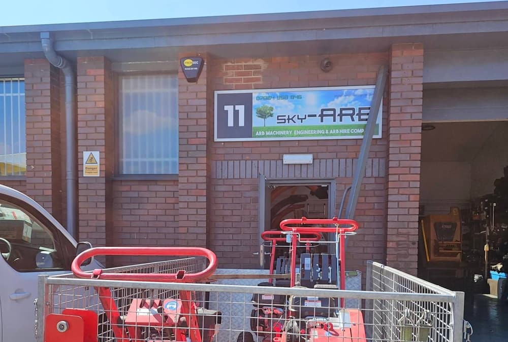 The Sky-Arb signage above the roller door at Dewar Court